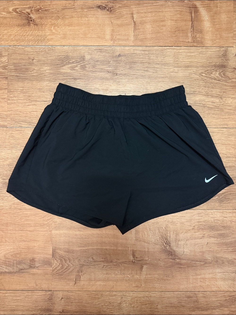Nike Women's Black Athletic Running Shorts with Silver Swoosh